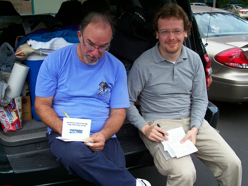 DSC02522_0766 Updating our logbooks with dive times, tank pressures and depth data.